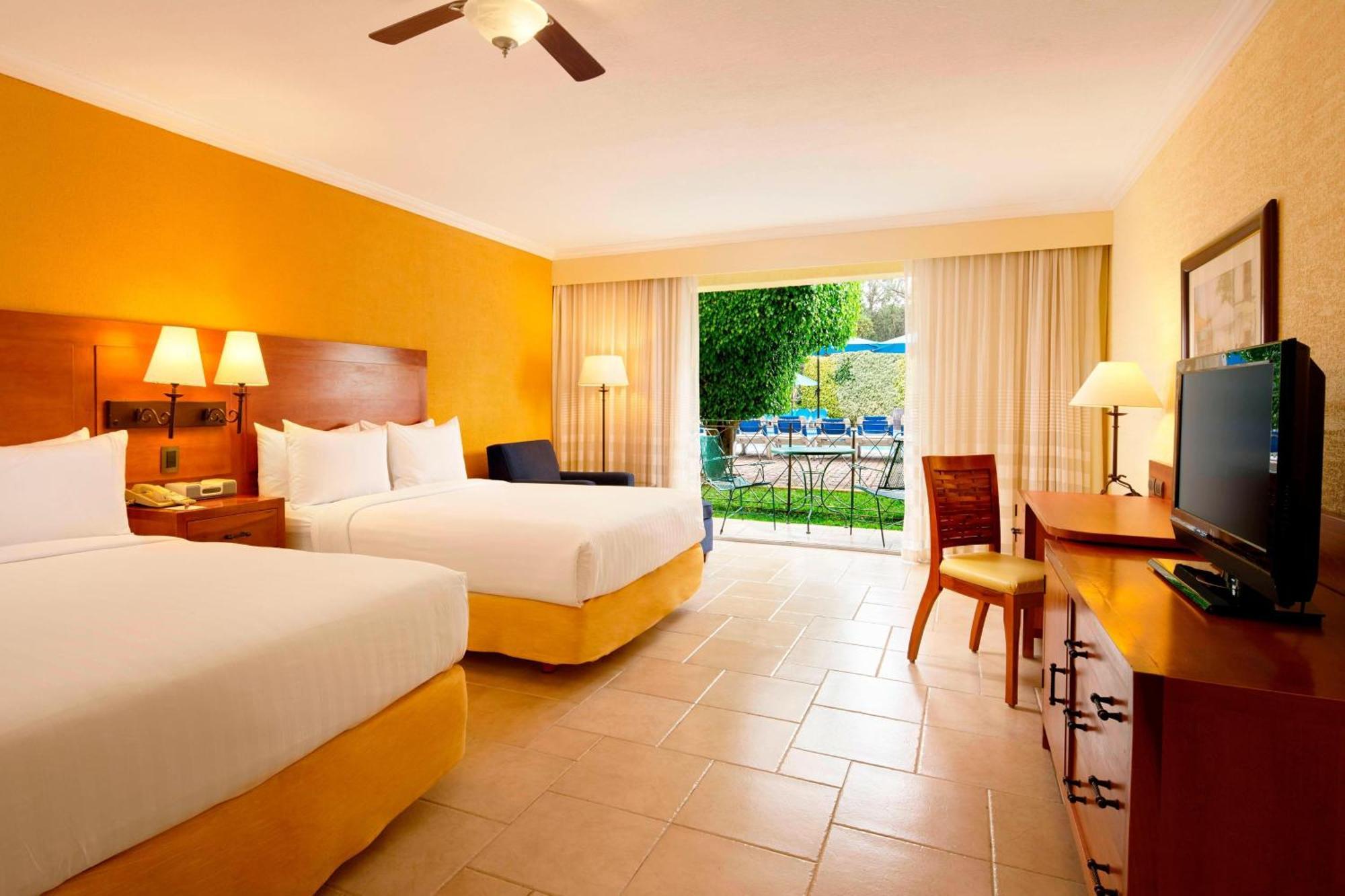 فندق وسبا ومركز مؤتمرات إكستابان دي لا سال ماريوت المظهر الخارجي الصورة A typical room at the Hilton Los Cabos